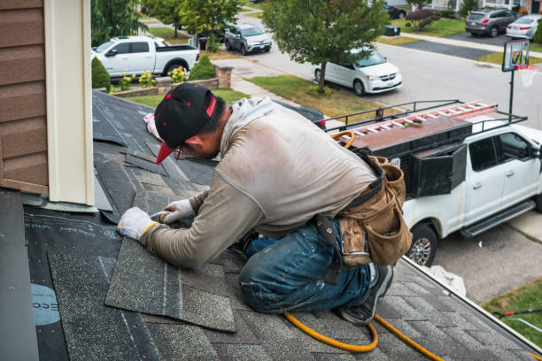Professional Roof Replacement technician working in Milan, KS